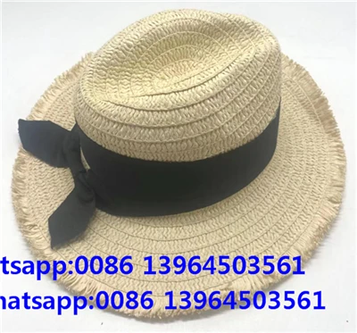 Sombrero de paja para el sol con borlas y lazo negro