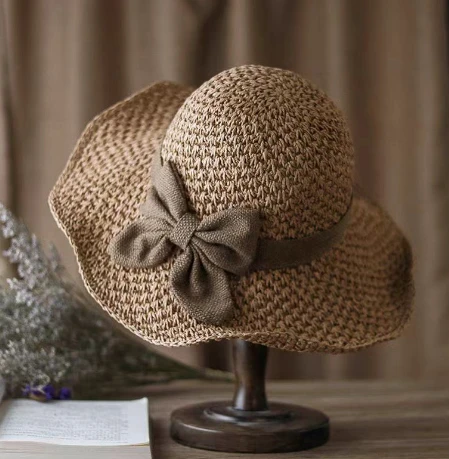 Sombreros de paja de color marrón para mujer
