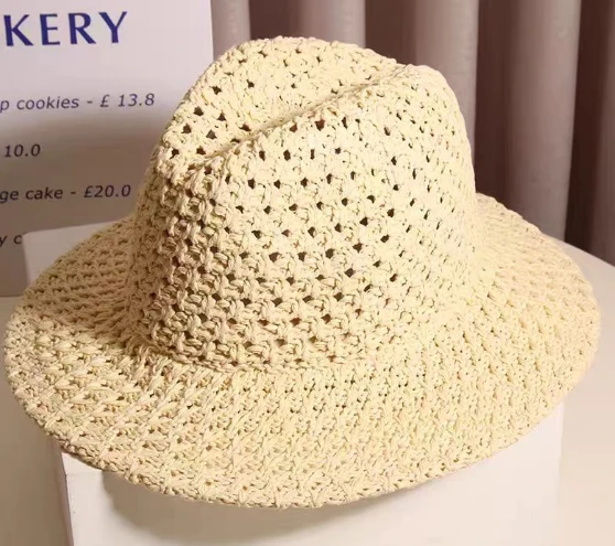 Sombrero de paja para mujer hecho a mano con flores huecas
