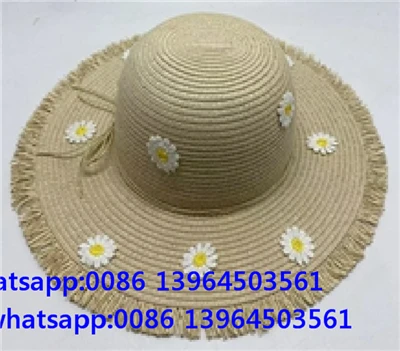 Sombrero de paja con flores y borlas para niña para verano