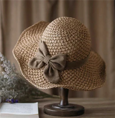 Sombreros de paja de color marrón para mujer